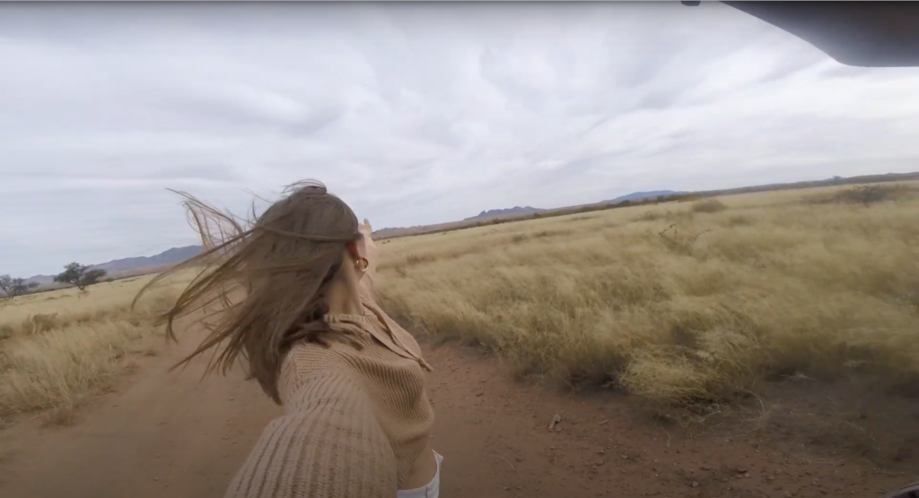 Sam flipping her hair in the wind in an action shot on a GoPro Hero Session